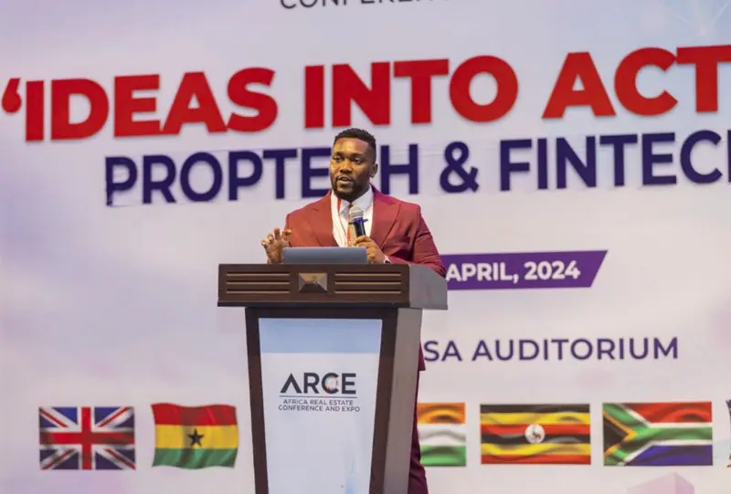IniOluwa Karunwi speaking at the ARCE 2024 lectern